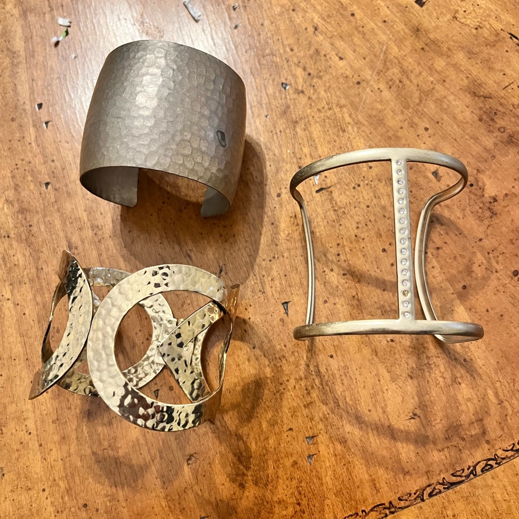 Set Of Three Metallic Cuff Bracelets 13$
